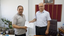MHP ŞUHUT İLÇE BAŞKANI KÜRŞAT AĞDUK MAZBATASINI ALDI