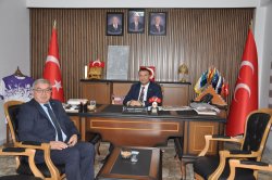 BAŞKAN ÖZAŞKIN MHP İL BAŞKANI KAHVECİ’Yİ ZİYARET ETTİ