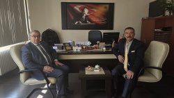 BAŞKAN ÖZAŞKIN’DAN MÜDÜR AYDOĞAN’A ZİYARET