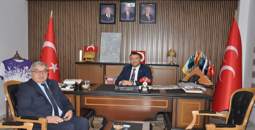 BAŞKAN ÖZAŞKIN MHP İL BAŞKANI KAHVECİ’Yİ ZİYARET ETTİ